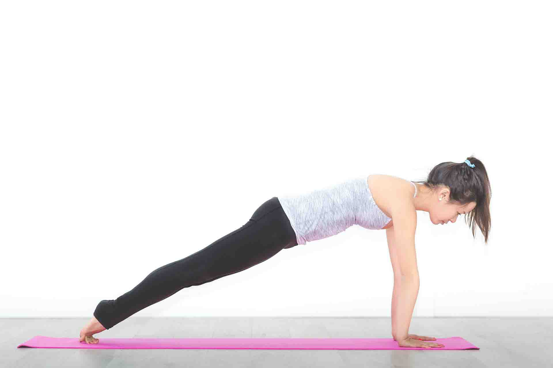 Women doing yoga on a slippery mat