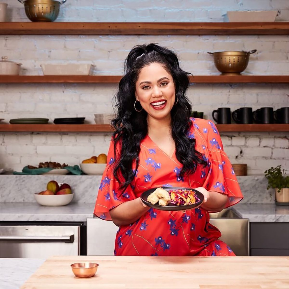 Ayesha Curry in a cooking show