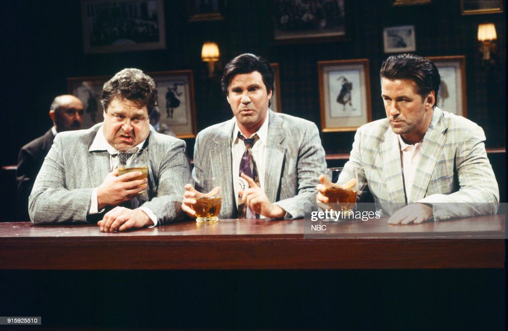 Saturday night live show scene with John Goodman, Willl Ferrel and Alec Baldwin.